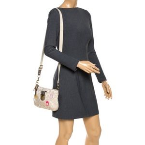 COACH POPPY Signature Canvas EMBROIDERED
"C" Swing Pack Crossbody #48425